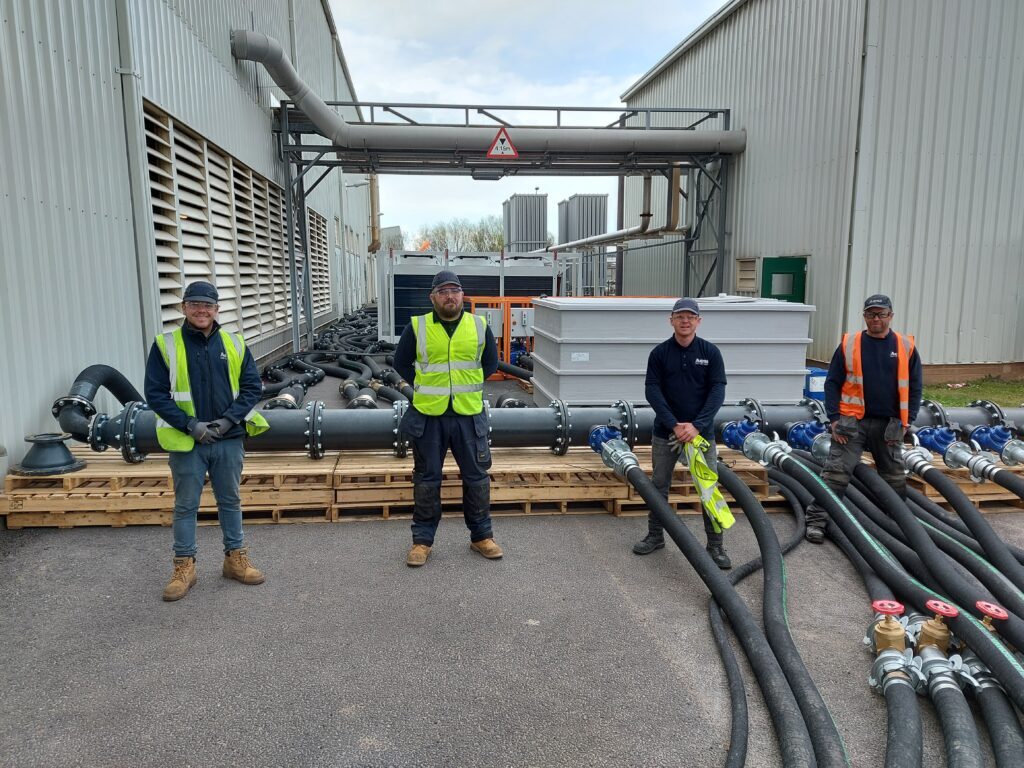 four men working on site for temperature control solutions